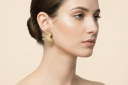Boucles d'oreilles demi soleils dorées