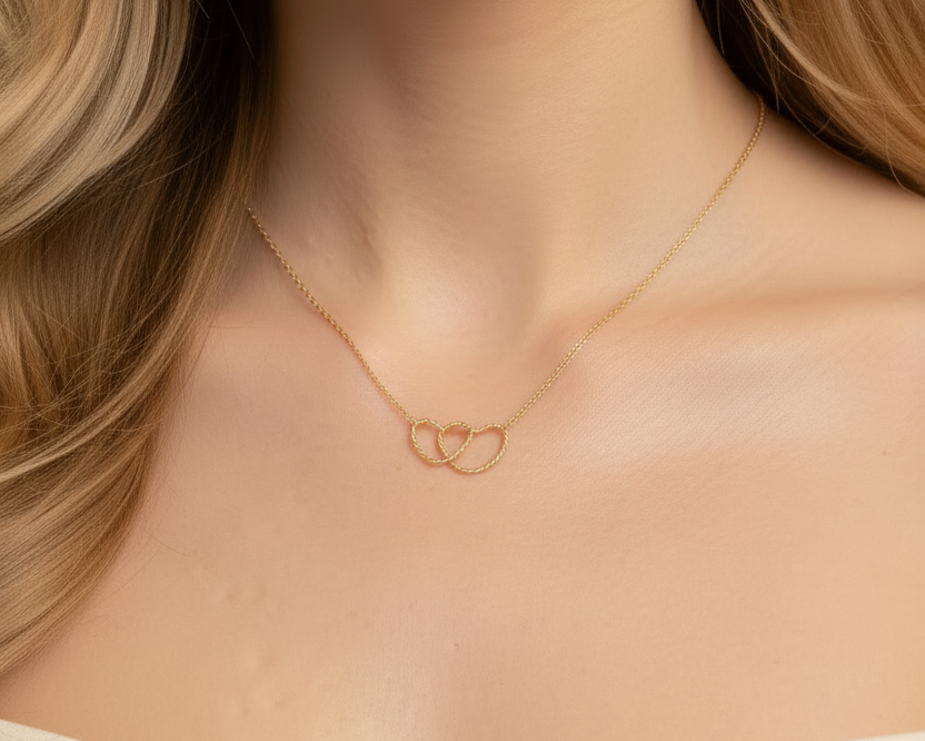 Collier double cœur doré en acier inoxydable