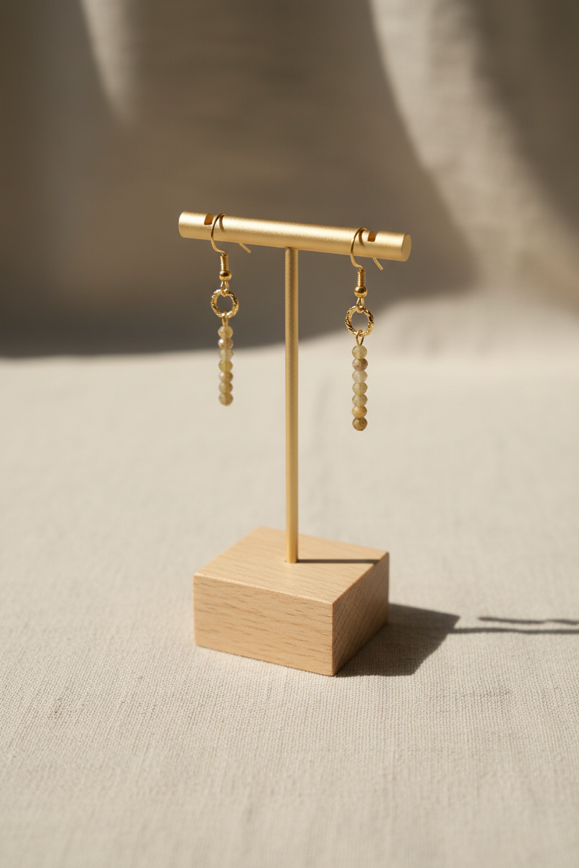 Boucle d'oreille pendante pierre