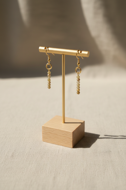 Boucle d'oreille pendante pierre