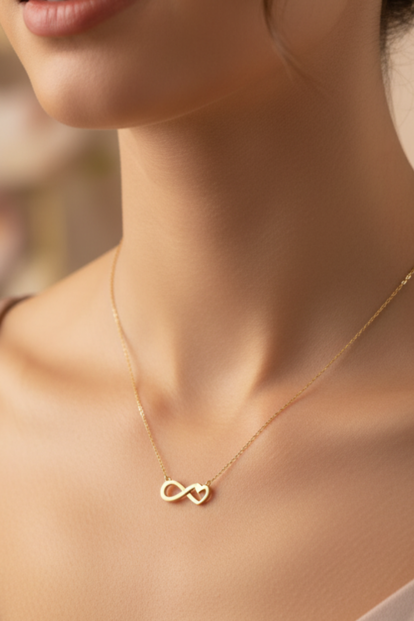 Collier doré double cœur infini