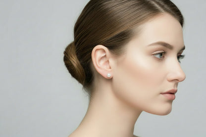 Clous d'oreilles perles d'eau blanc